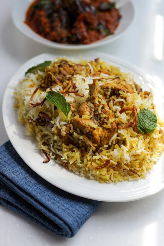 Illustrative photo of lamb biryani with fried onions and mint