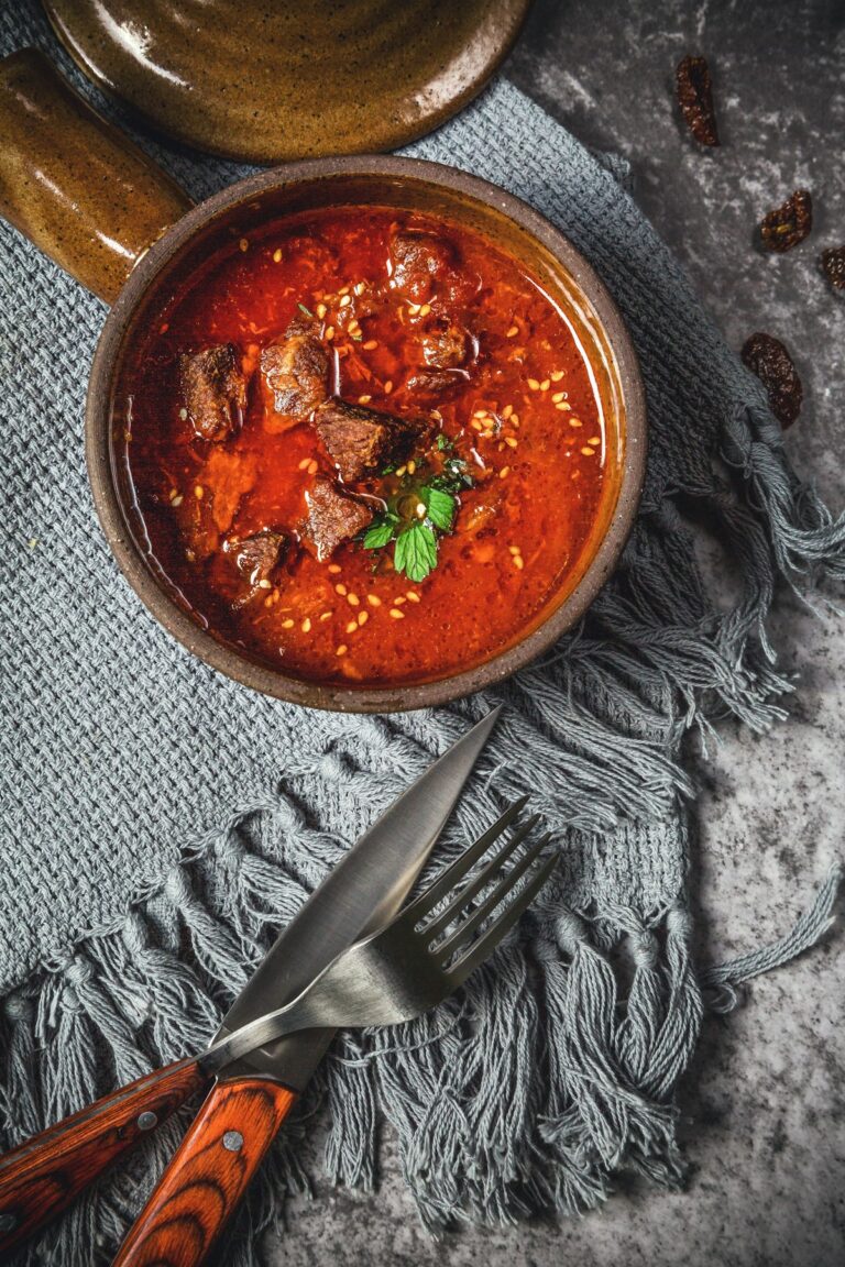 Illustrative photo of lamb rogan josh in a red Kashmiri curry