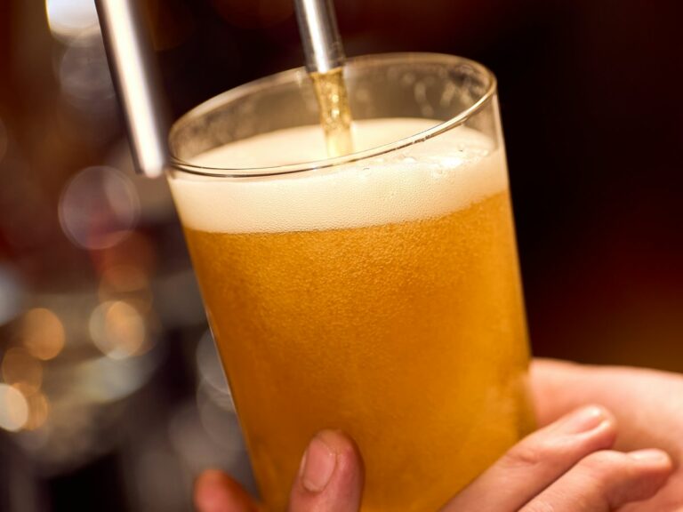 Illustrative photo of a freshly poured golden beer