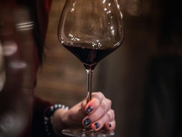 Illustrative photo of a glass of red wine